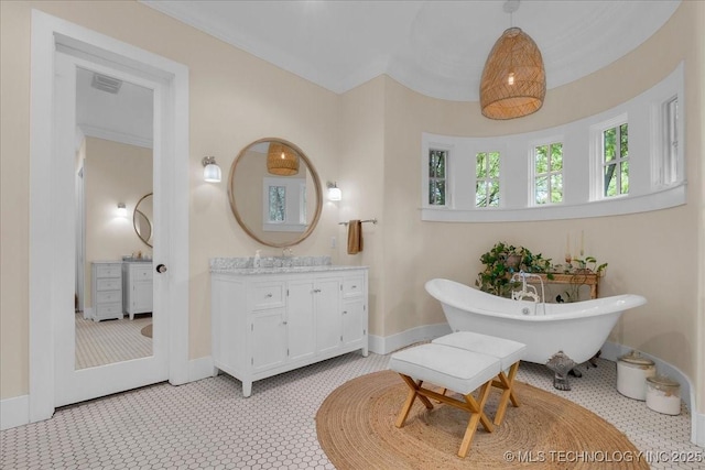 20565 E Clear Brook Rd, Owasso, OK 74055 - bathroom with vanity and a freestanding bath