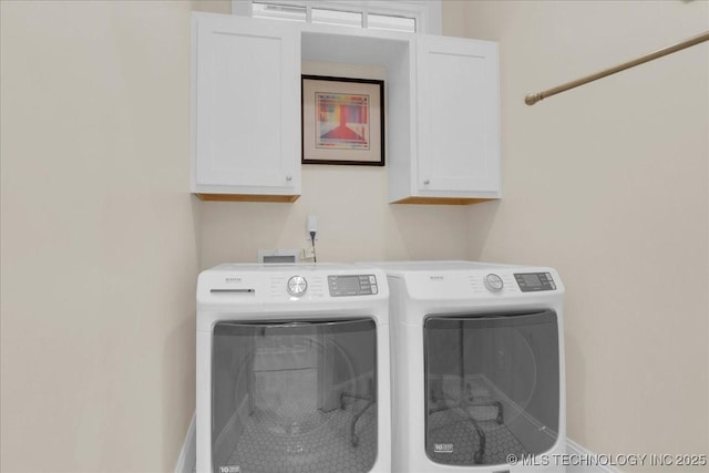 20565 E Clear Brook Rd, Owasso, OK 74055 - washroom featuring cabinet space and washer and dryer
