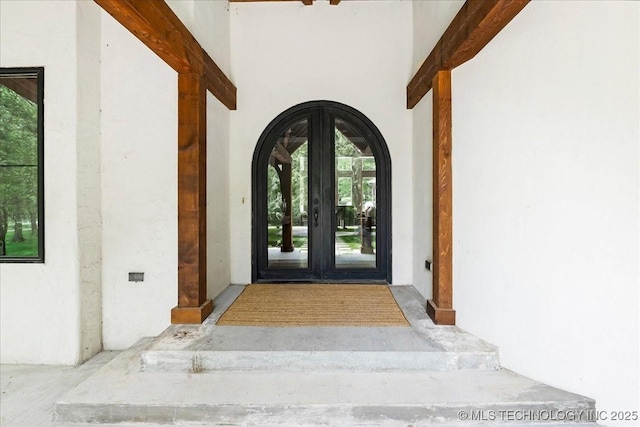 20565 E Clear Brook Rd, Owasso, OK 74055 - view of exterior entry with french doors and stucco siding