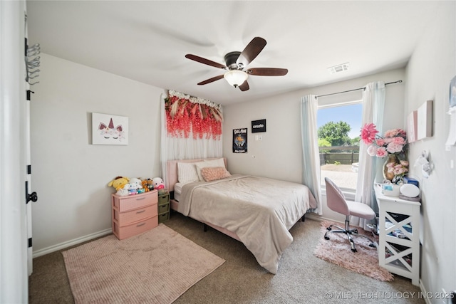 14400 E Willow Way, Claremore, OK 74019 - carpeted bedroom featuring ceiling fan and baseboards