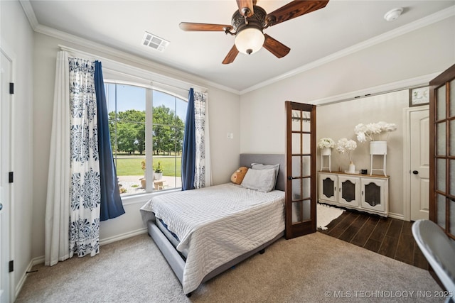 14400 E Willow Way, Claremore, OK 74019 - bedroom with crown molding, french doors, carpet, a ceiling fan, and wood finished floors
