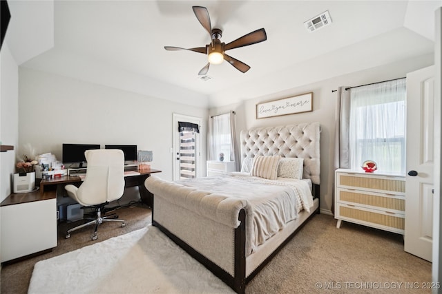 14400 E Willow Way, Claremore, OK 74019 - carpeted bedroom featuring multiple windows, an office area, and ceiling fan