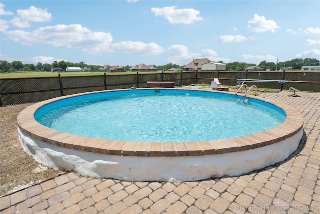 14400 E Willow Way, Claremore, OK 74019 - view of swimming pool with a fenced backyard