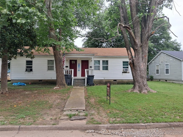 327 Ash, Ardmore, OK 73401 - view of front facade featuring crawl space, a front lawn, and roof with shingles