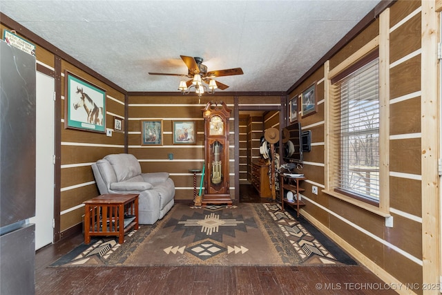 46367 County Road 553, Colcord, OK 74338 - sitting room with ceiling fan and a textured ceiling