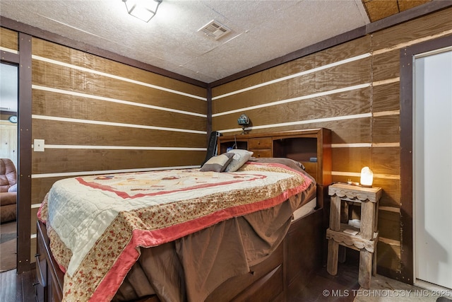 46367 County Road 553, Colcord, OK 74338 - bedroom with wooden walls