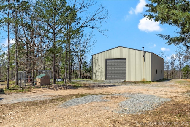 46367 County Road 553, Colcord, OK 74338 - detached garage featuring driveway