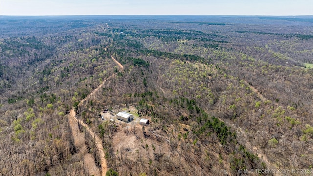 46367 County Road 553, Colcord, OK 74338 - aerial view of property and surrounding area with a forest