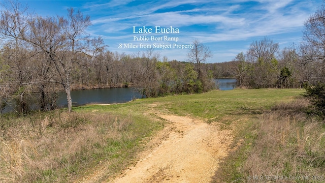 46367 County Road 553, Colcord, OK 74338 - water view with a heavily wooded area