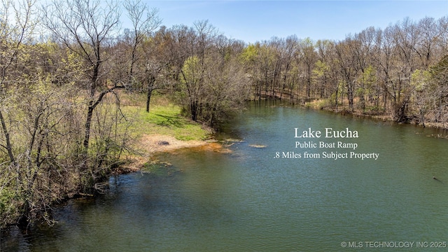 46367 County Road 553, Colcord, OK 74338 - water view with a forest