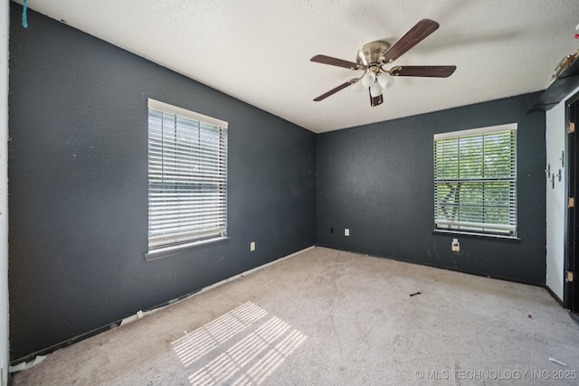 909 N Ross St, Sapulpa, OK 74066 - carpeted spare room featuring a ceiling fan