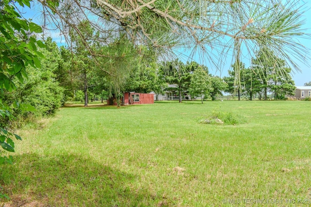 3180 E 2090th Rd, Hugo, OK 74743 - view of green lawn featuring an outdoor structure