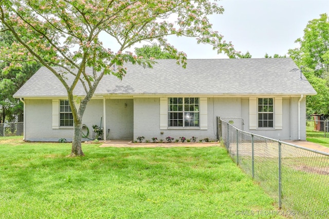 3180 E 2090th Rd, Hugo, OK 74743 - view of front facade featuring a fenced backyard, roof with shingles, and brick siding