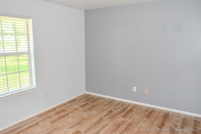 3180 E 2090th Rd, Hugo, OK 74743 - spare room featuring wood finished floors
