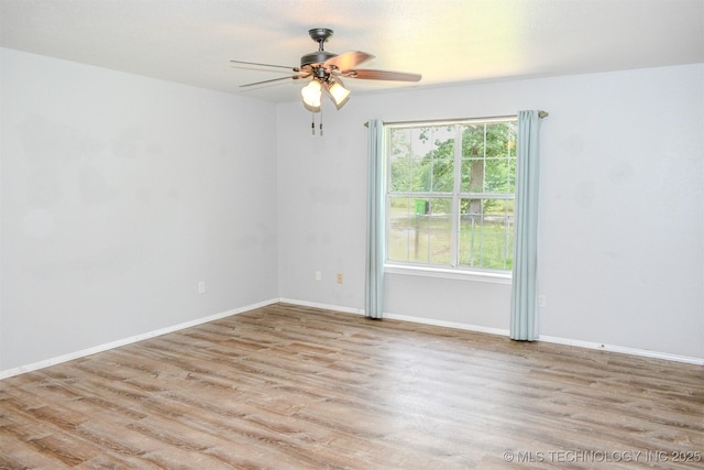 3180 E 2090th Rd, Hugo, OK 74743 - unfurnished room with ceiling fan and wood finished floors