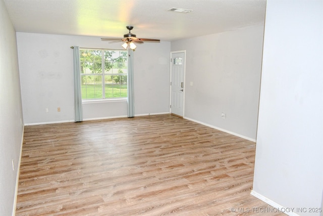 3180 E 2090th Rd, Hugo, OK 74743 - spare room with a ceiling fan and wood finished floors