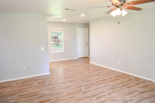 3180 E 2090th Rd, Hugo, OK 74743 - empty room with light wood finished floors, ceiling fan, and recessed lighting