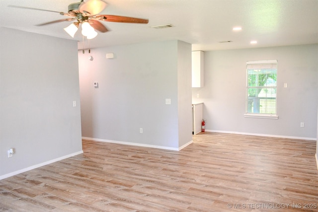 3180 E 2090th Rd, Hugo, OK 74743 - unfurnished room with light wood-type flooring, ceiling fan, and recessed lighting