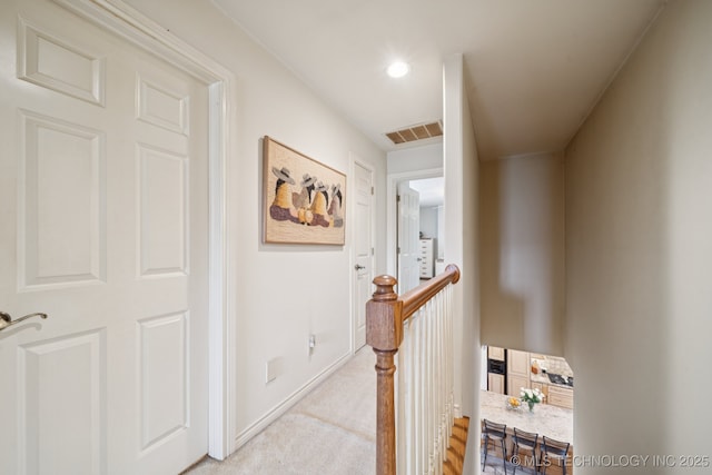 7721 E 101st Pl, Tulsa, OK 74133 - hallway with an upstairs landing, recessed lighting, and light carpet