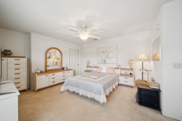 7721 E 101st Pl, Tulsa, OK 74133 - bedroom featuring light colored carpet and ceiling fan