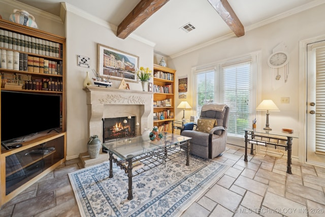 7721 E 101st Pl, Tulsa, OK 74133 - living room featuring beam ceiling, stone tile floors, a fireplace, and ornamental molding