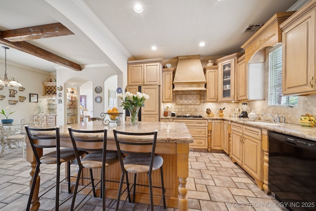 7721 E 101st Pl, Tulsa, OK 74133 - kitchen with dishwasher, premium range hood, a kitchen breakfast bar, a center island, and tasteful backsplash