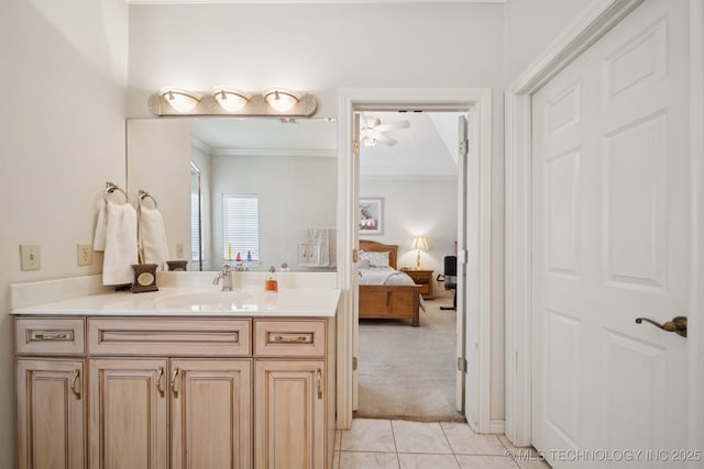 7721 E 101st Pl, Tulsa, OK 74133 - bathroom with vanity, connected bathroom, ornamental molding, tile patterned floors, and a ceiling fan