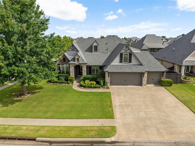 425 W 128th St S, Jenks, OK 74037 - view of front of home with concrete driveway, a front lawn, a shingled roof, a garage, and brick siding