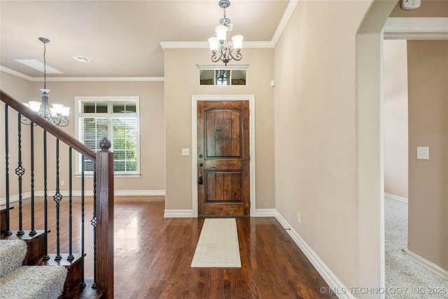 425 W 128th St S, Jenks, OK 74037 - entryway with a chandelier, stairs, arched walkways, wood finished floors, and crown molding