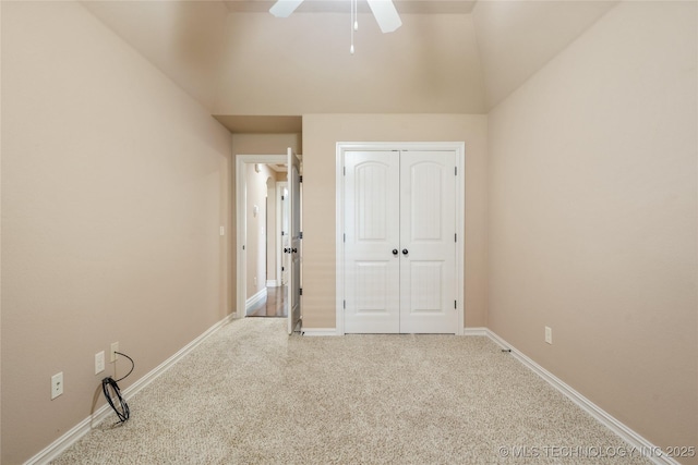 425 W 128th St S, Jenks, OK 74037 - unfurnished bedroom featuring carpet, a closet, ceiling fan, and vaulted ceiling