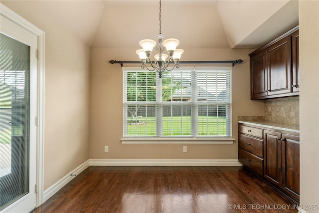 425 W 128th St S, Jenks, OK 74037 - unfurnished dining area featuring a chandelier, vaulted ceiling, and dark wood-style floors
