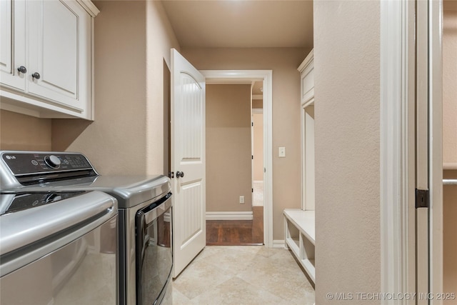 425 W 128th St S, Jenks, OK 74037 - laundry area with separate washer and dryer, cabinet space, and light tile patterned floors