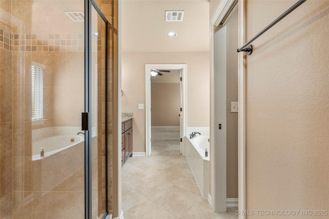 425 W 128th St S, Jenks, OK 74037 - full bath with vanity, a bath, and a stall shower