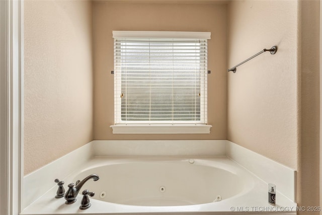 425 W 128th St S, Jenks, OK 74037 - full bathroom with a whirlpool tub and a textured wall