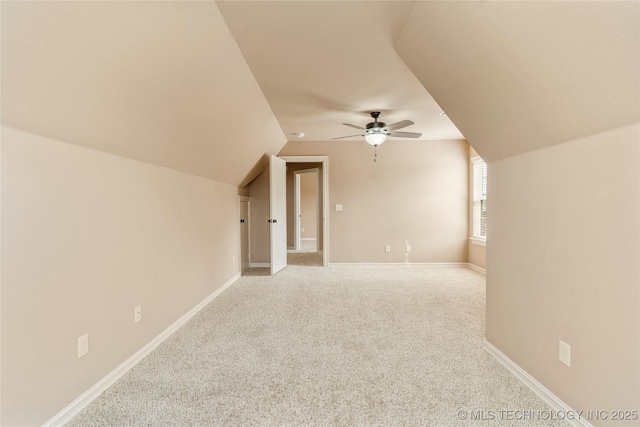 425 W 128th St S, Jenks, OK 74037 - additional living space featuring a ceiling fan, light colored carpet, and vaulted ceiling