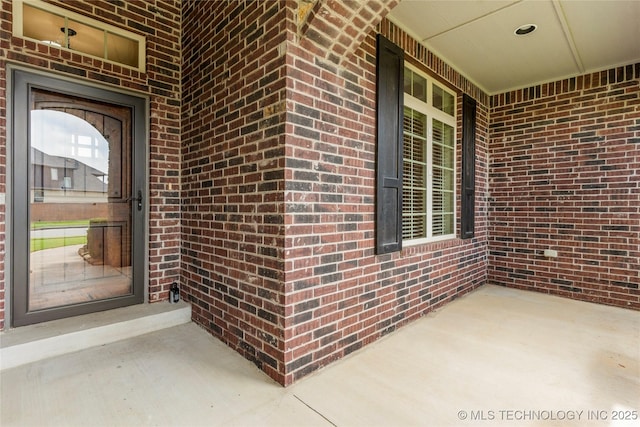425 W 128th St S, Jenks, OK 74037 - property entrance featuring brick siding