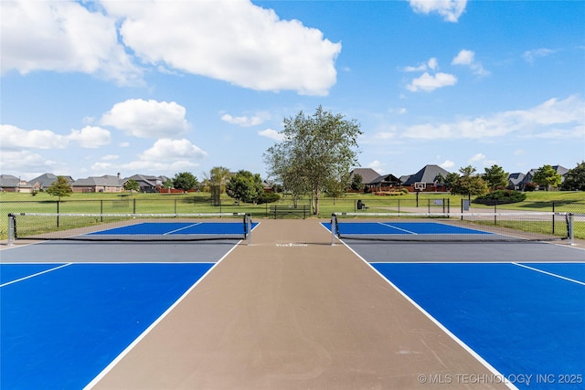 425 W 128th St S, Jenks, OK 74037 - view of tennis court with community basketball court and a residential view