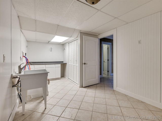109 E Bk 800th Rd, Stigler, OK 74462 - kitchen featuring light tile patterned floors, a paneled ceiling, white cabinetry, and dark countertops