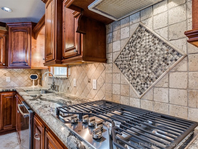 109 E Bk 800th Rd, Stigler, OK 74462 - kitchen with appliances with stainless steel finishes, light stone countertops, and decorative backsplash