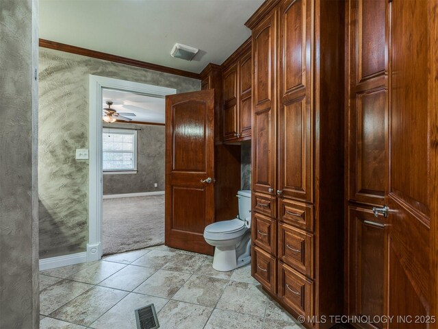 109 E Bk 800th Rd, Stigler, OK 74462 - bathroom with ornamental molding and a ceiling fan