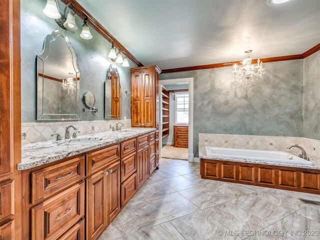 109 E Bk 800th Rd, Stigler, OK 74462 - bathroom with ornamental molding, double vanity, a chandelier, and a bath