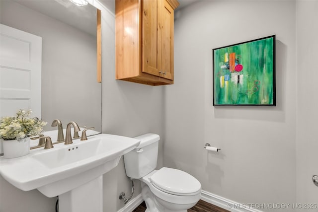 7380 Royalwood Way, Tulsa, OK 74131 - bathroom with a sink and wood finished floors