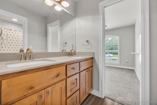 7380 Royalwood Way, Tulsa, OK 74131 - full bathroom featuring double vanity and wood finished floors
