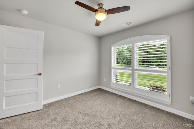 7380 Royalwood Way, Tulsa, OK 74131 - unfurnished room with a smoke detector, carpet flooring, and ceiling fan