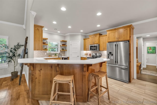 7380 Royalwood Way, Tulsa, OK 74131 - kitchen featuring appliances with stainless steel finishes, crown molding, light countertops, open shelves, and light wood-style flooring
