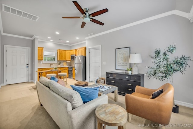7380 Royalwood Way, Tulsa, OK 74131 - living room with ceiling fan, ornamental molding, and recessed lighting