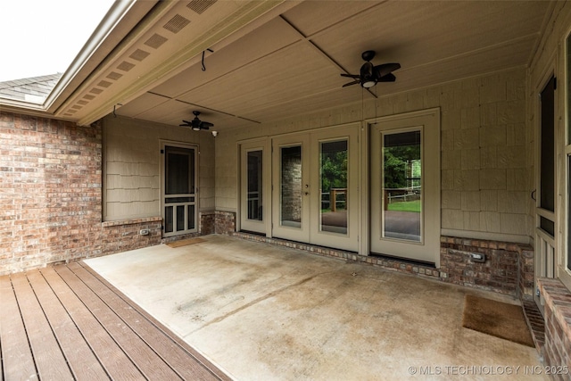 7380 Royalwood Way, Tulsa, OK 74131 - deck with ceiling fan, a patio area, and french doors
