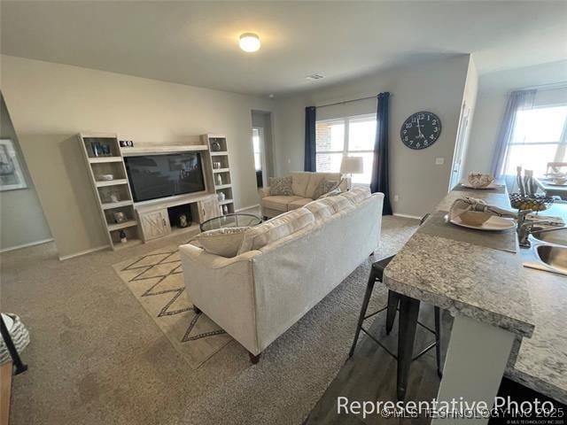 27310 E 117th Pl S, Coweta, OK 74429 - carpeted living area with baseboards
