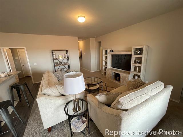 27310 E 117th Pl S, Coweta, OK 74429 - living room with baseboards