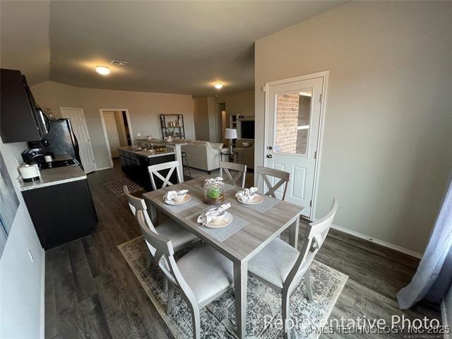 27310 E 117th Pl S, Coweta, OK 74429 - dining room featuring dark wood-style flooring and baseboards